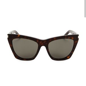 Saint Laurent tortoise sunglasses for sale. Good condition/scratches. Authentic.